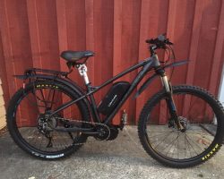 HARO DOUBLE PEAK COMP PLUS SET UP FOR HUNTING WITH SUPER STICKY TYRES, HEAVY DUTY CARRIER & LOW GEARING FOR LONG SLOW HILLS